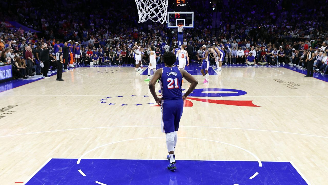 Joel Embiid looks on at Wells Fargo Center