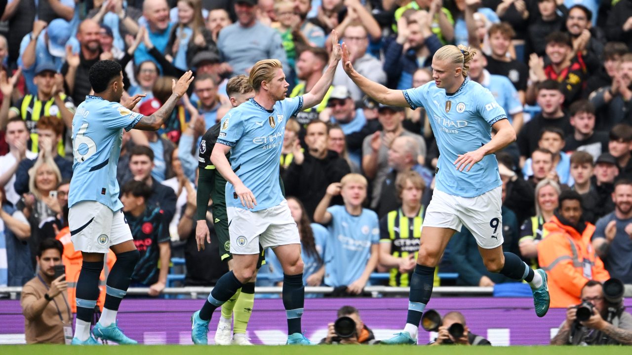 Erling Haaland of Manchester City celebrates scoring with teammates